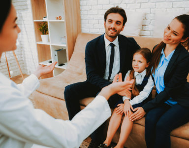 couple consulting to therapist with their child